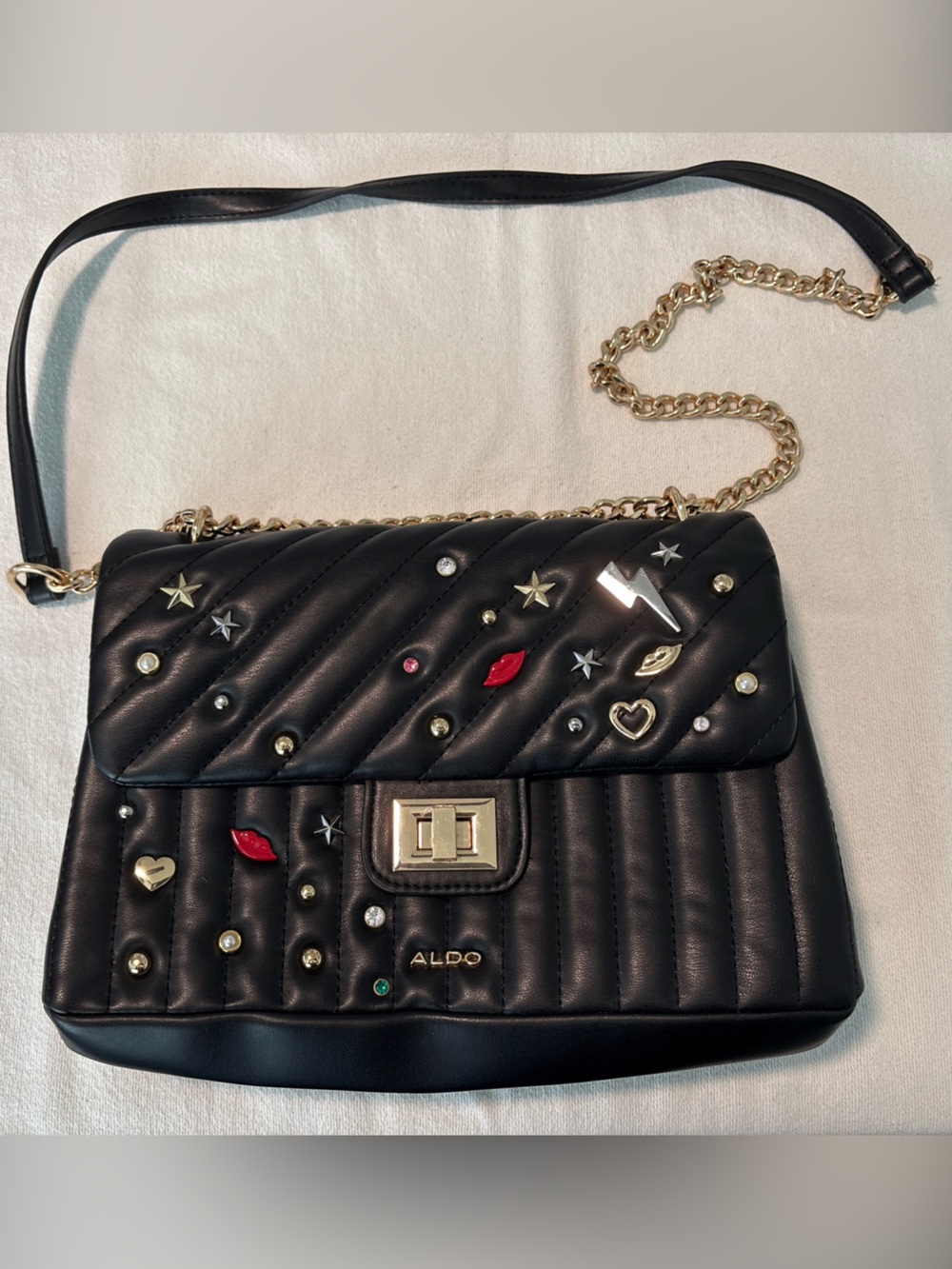 ALDO Black Quilted Crossbody Bag with Gold Chain and Novelty Studs